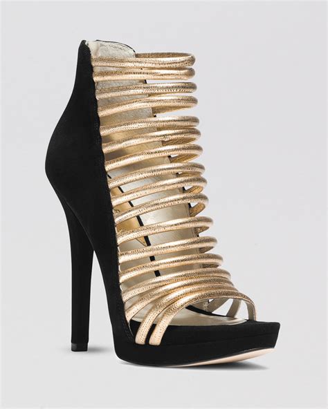 michael kors black and gold shoes|michael kors boots gold heel.